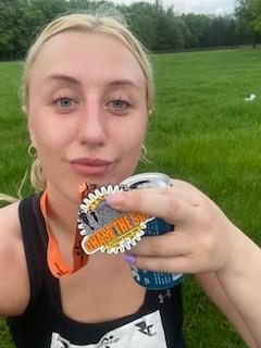 Tallulah holding a medal