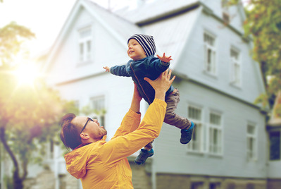 Father holding son up