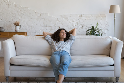 Woman on a couch relaxing
