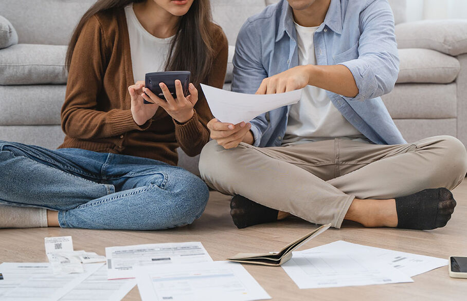 Couple looking through finances 