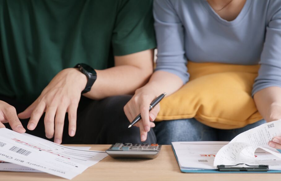 Couple looking through finances 