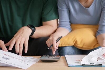 Couple looking through finances 