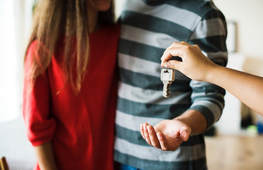 two people collecting keys