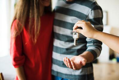two people collecting keys