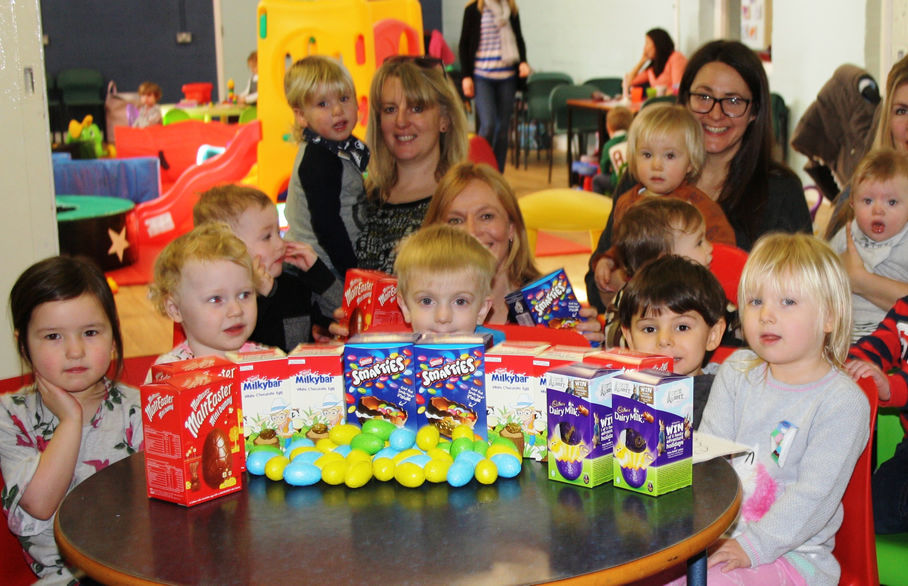 Children and parents at Portishead's youth and community centre, with Easter Eggs donated by Reeds Rains