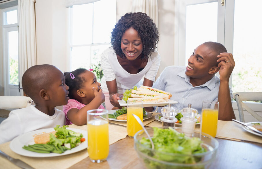 Family sat at the kitchen table