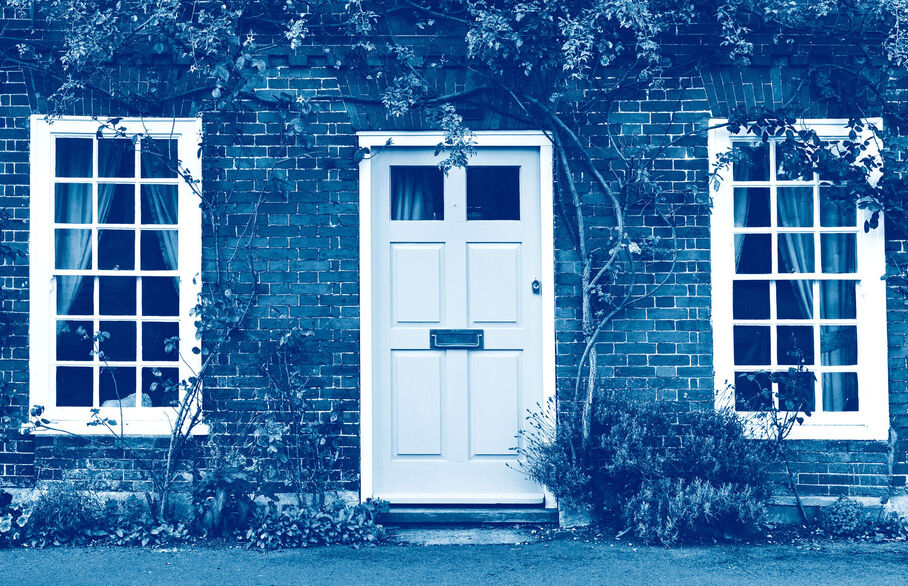 Picture of a door and window to a cottage