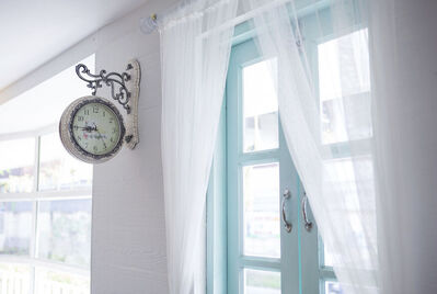 Clock on the wall in a house