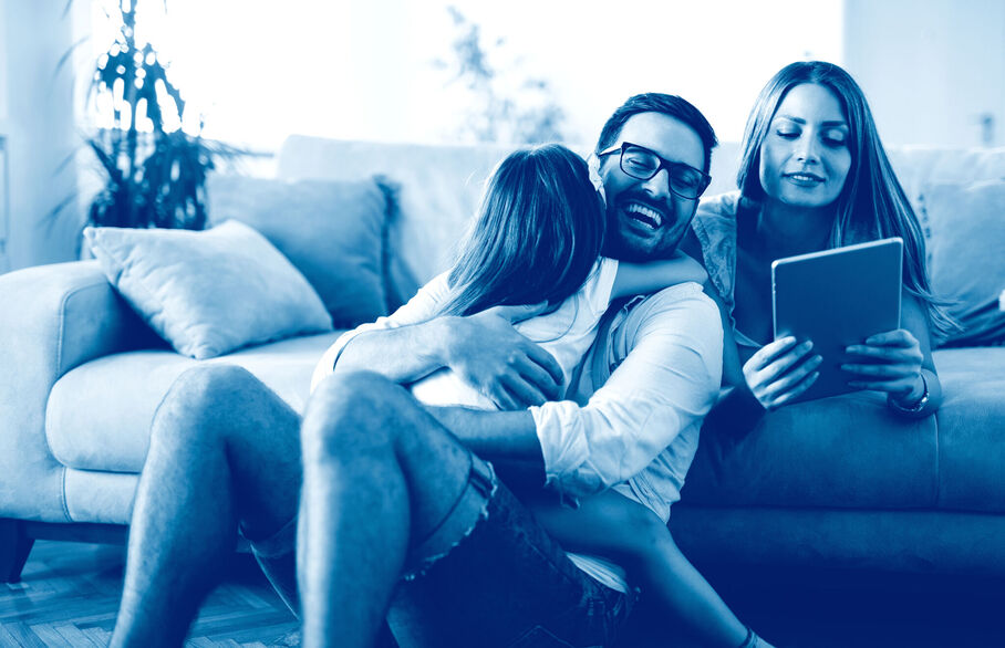 Family looking at a computer