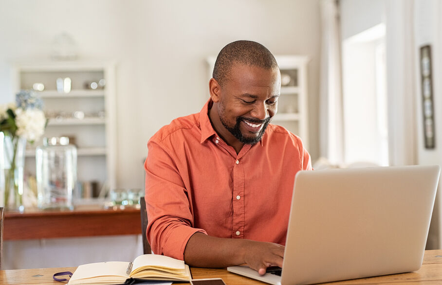 Man sat at laptop