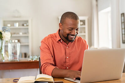 Man sat at laptop