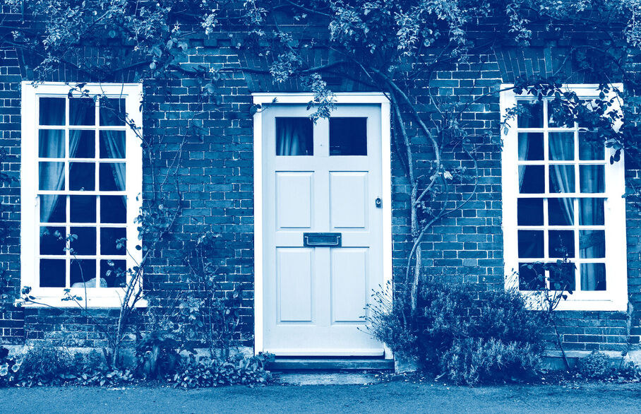 Outside of house with closed blue door