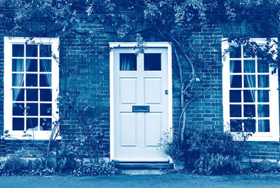 Outside of house with closed blue door