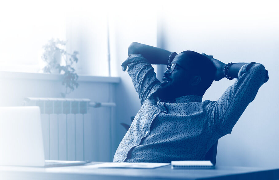 Man resting at desk