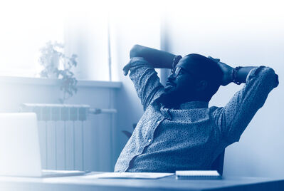 Man resting at desk