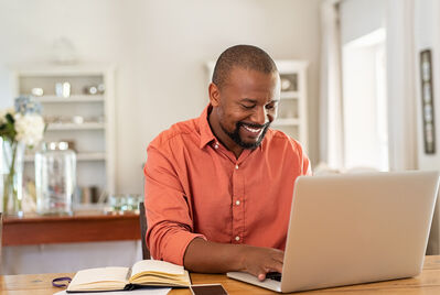 Person looking at a laptop