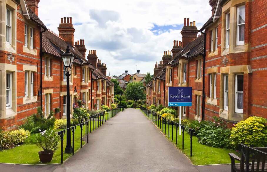 Two rows of houses opposite a path